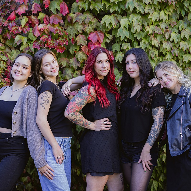 Violet Hair Lounge staff striking a pose on a downtown Nanaimo dock