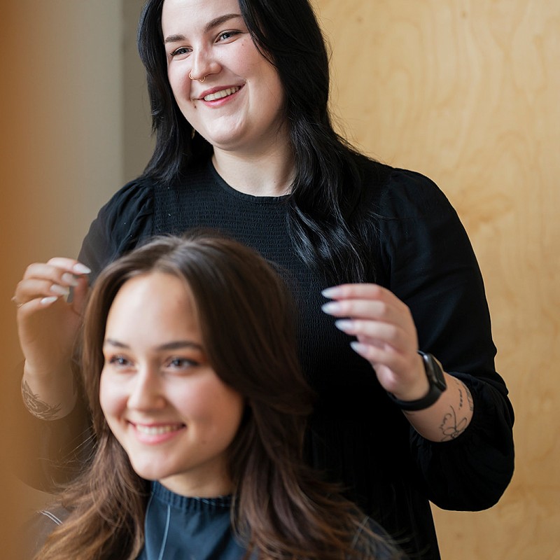 Stylist Alena discusses her next steps with a salon client